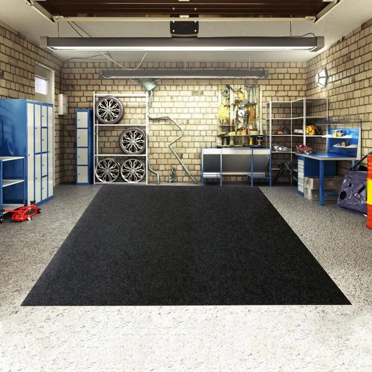 Black protective mat on Dubai garage floor, spacious area