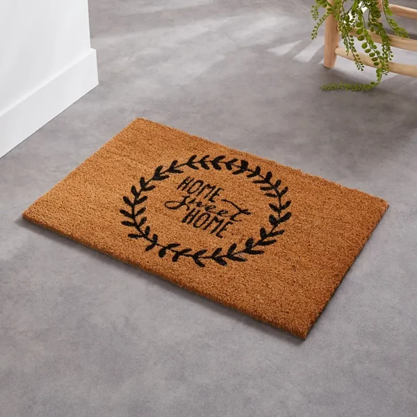 Doormat with Home Sweet Home in a leaf wreath.