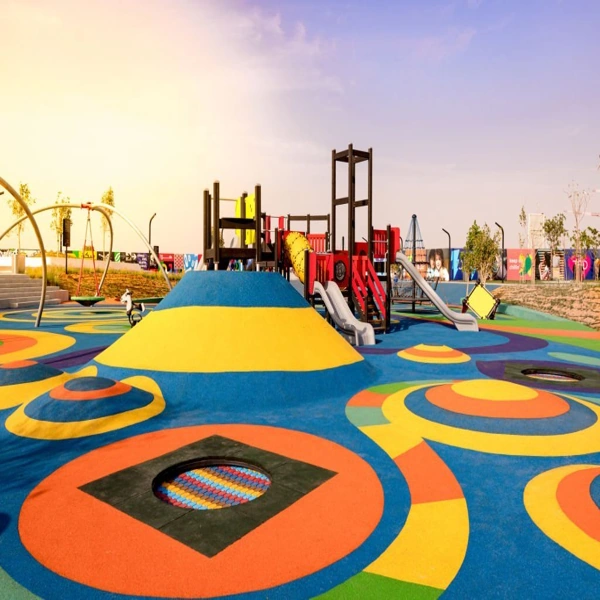 Vibrant EPDM rubber playground with colorful patterns and structures.