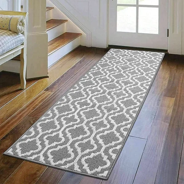 grey and white patterned runner rug on a wooden floor Runner Mats