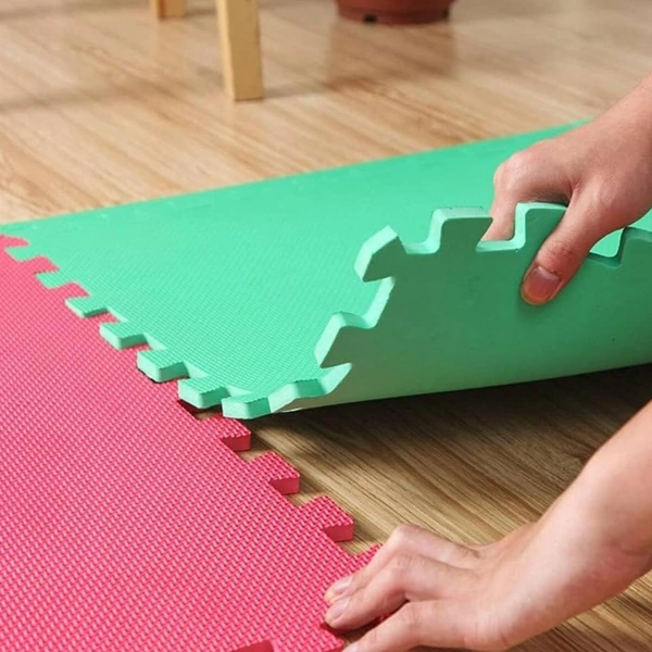 Interlocking foam mats in Dubai being assembled