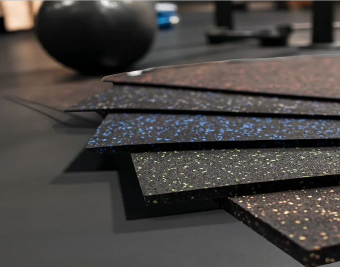 A selection of colorful, speckled rubber flooring samples