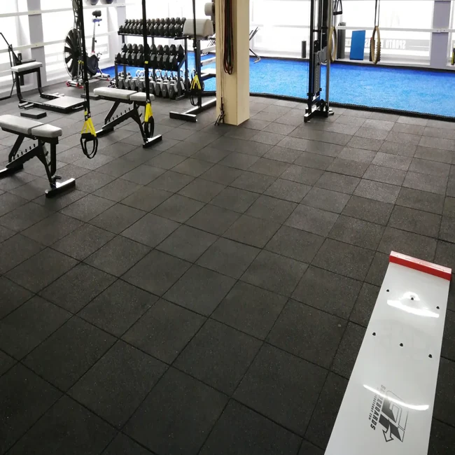 Black tiled rubber flooring in a gym