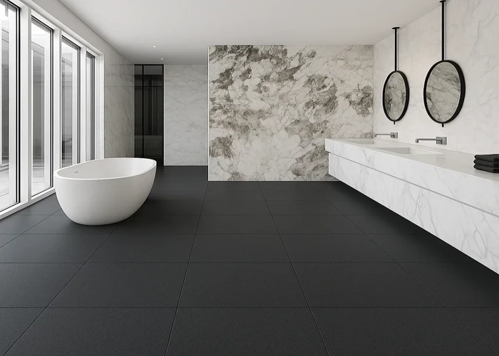 spacious, modern bathroom with black rubber floor tiles