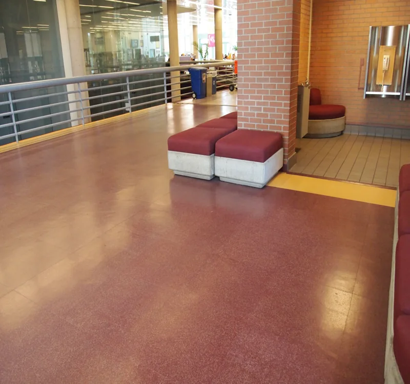Maroon rubber flooring in a public